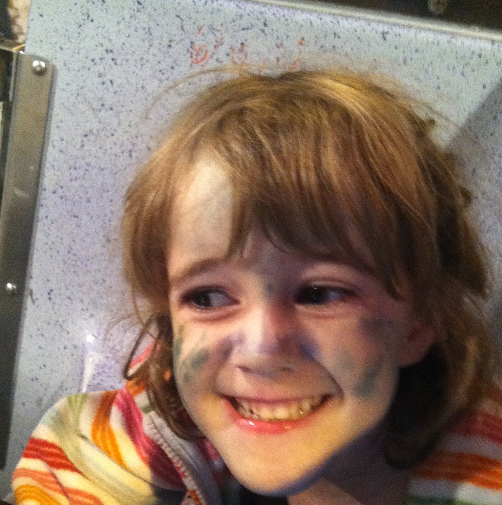 My younger daughter on a ferris wheel.